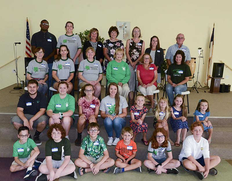 All age groups gathered to celebrate at the Hollymount 4-H reunion. Shown are in back (l-r) Daniel Tull, Abby Webb, Virginia Griffith, Ann Hurley, Sarah Berninger, Jamie Loucks, and Roland Hill Jr.; third row, Margaret Webb, Amy Kuhlman, Amy West, Jay Hukill, Laura Hill, and Sharon Anderson; second row, Kyle Morris, Ainsley West, Katie Kuhlman, Holly Anderson, Addison Freebery, Ava Allfather, Claire Denham, and Julia Freebery. In front are Joel Denham, Declan West, Sam Gossett, Cody Kuhlman, Morgan Everts, and Brandon Loucks.